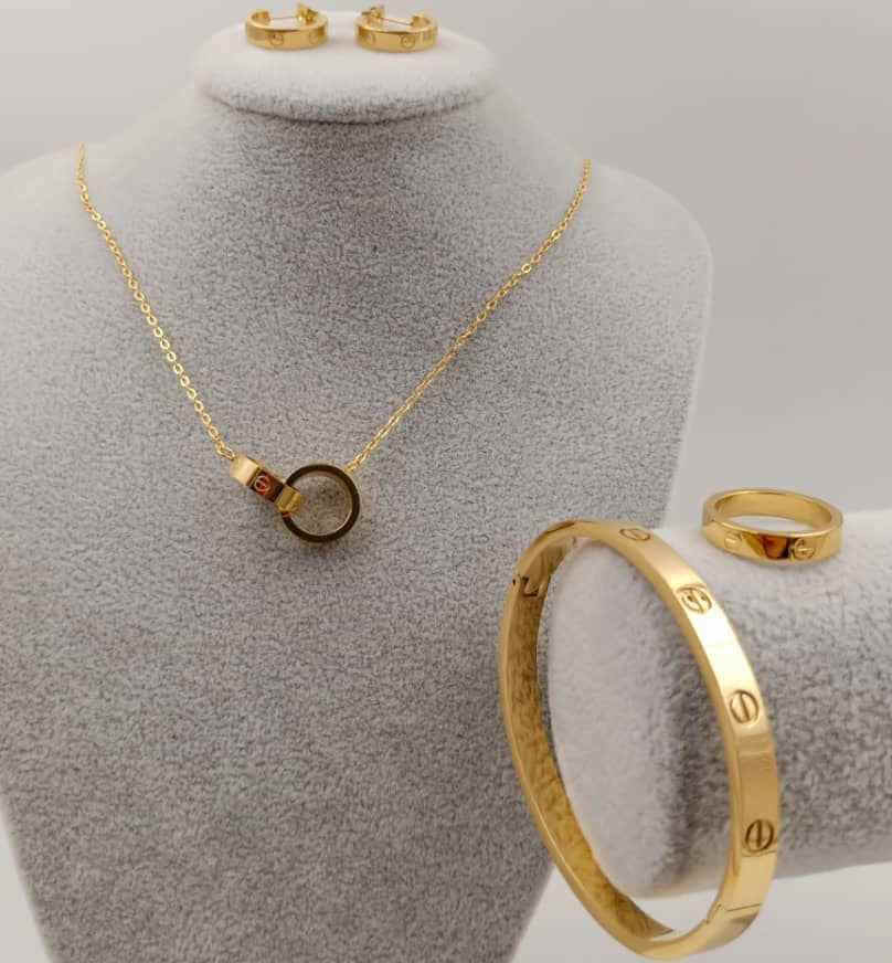 Queen's Jewelry Set featuring a regal statement necklace and matching crown-inspired earrings.