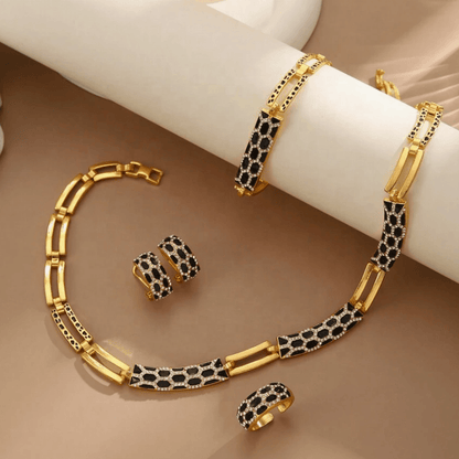 Harmony Jewelry Set featuring a coordinated luxury necklace and matching drop earrings with a brilliant finish.